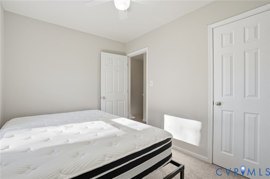 3605 Whitehouse Road Colonial Heights, VA 23834 - Photo 26 of 46 Bedroom featuring light carpet and ceiling fan