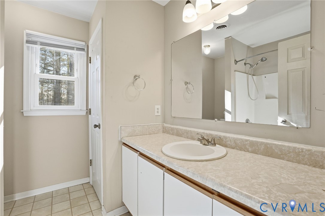 3605 Whitehouse Road Colonial Heights, VA 23834 - Photo 27 of 46 Bathroom featuring vanity, a bathtub, a shower, an