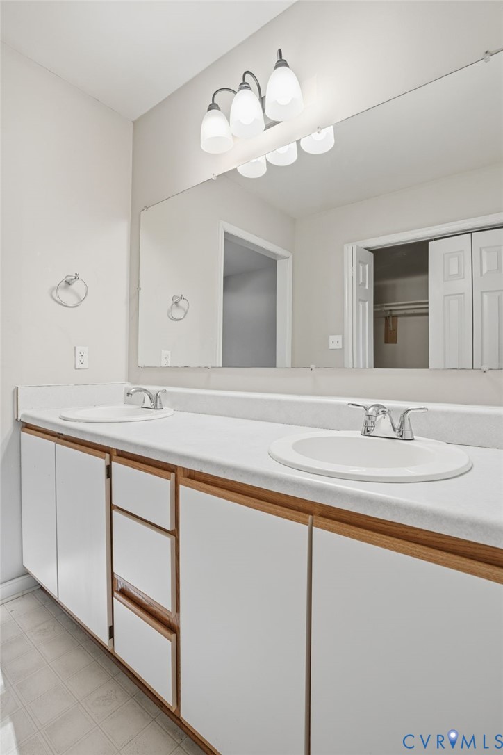 3605 Whitehouse Road Colonial Heights, VA 23834 - Photo 28 of 46 Full bathroom featuring double vanity and light fl