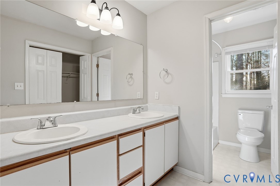 3605 Whitehouse Road Colonial Heights, VA 23834 - Photo 31 of 46 Bathroom with double vanity, light flooring, showe