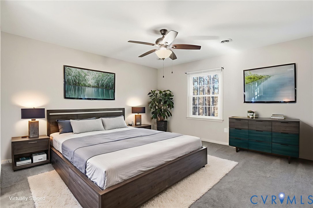 3605 Whitehouse Road Colonial Heights, VA 23834 - Photo 35 of 46 Carpeted bedroom featuring baseboards and ceiling