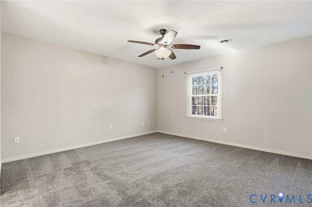 3605 Whitehouse Road Colonial Heights, VA 23834 - Photo 36 of 46 Spare room featuring light colored carpet and a ce