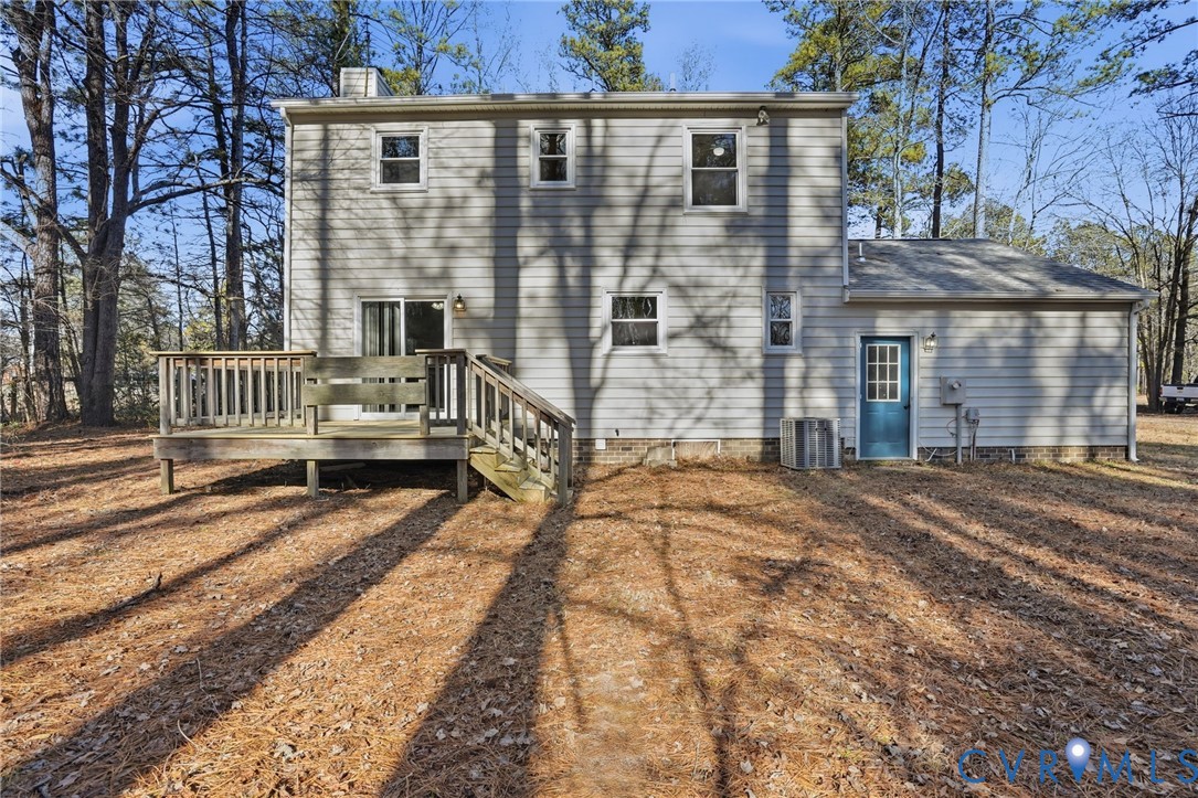 3605 Whitehouse Road Colonial Heights, VA 23834 - Photo 42 of 46 Rear view of property with a chimney and a wooden
