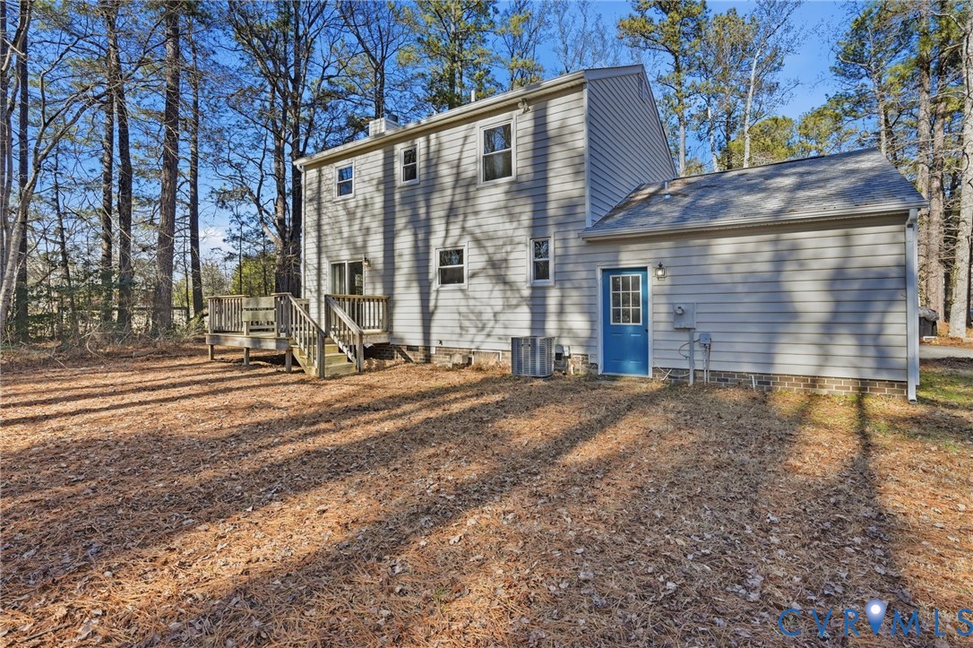 3605 Whitehouse Road Colonial Heights, VA 23834 - Photo 43 of 46 Back of property featuring a chimney and a wooden