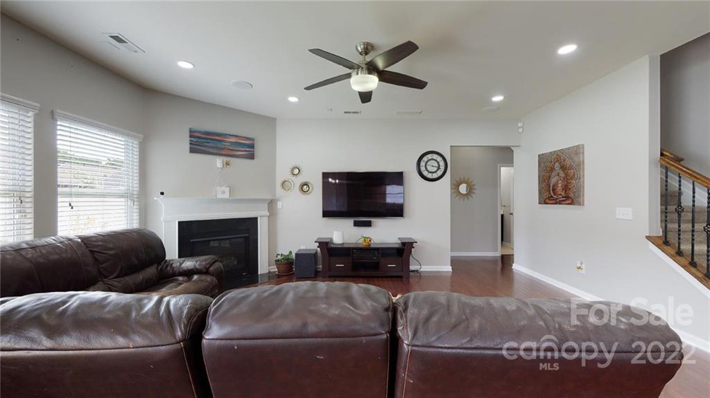 1549 Spring Blossom Trail Fort Mill, SC 29708 - Photo 23 of 45 a living room with furniture and a flat screen tv