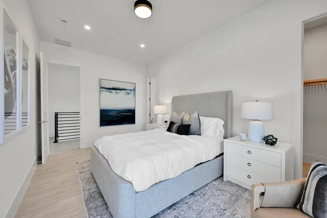 a kitchen with a stove and a potted plant