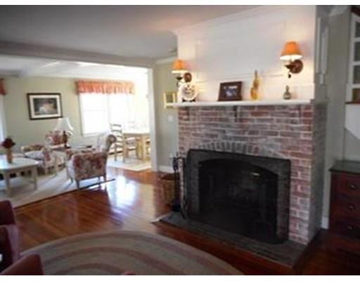 445 Williston Road Bourne, MA 02562 - Photo 9 of 23 a living room with furniture and a fireplace