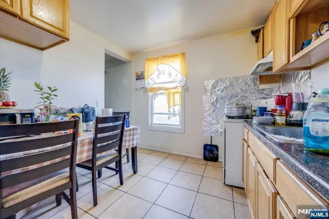 a kitchen that has a cabinets and a window
