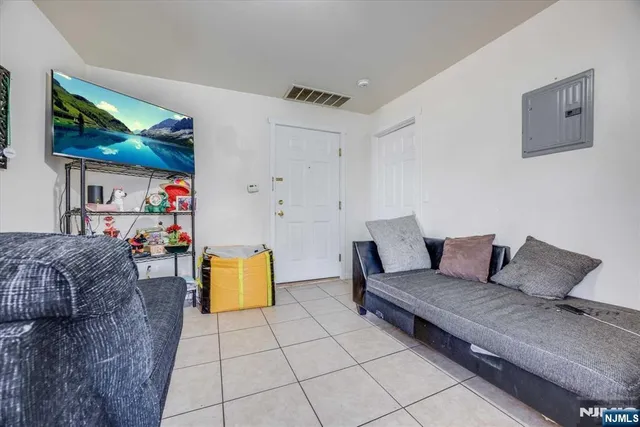 a living room with furniture and a couch