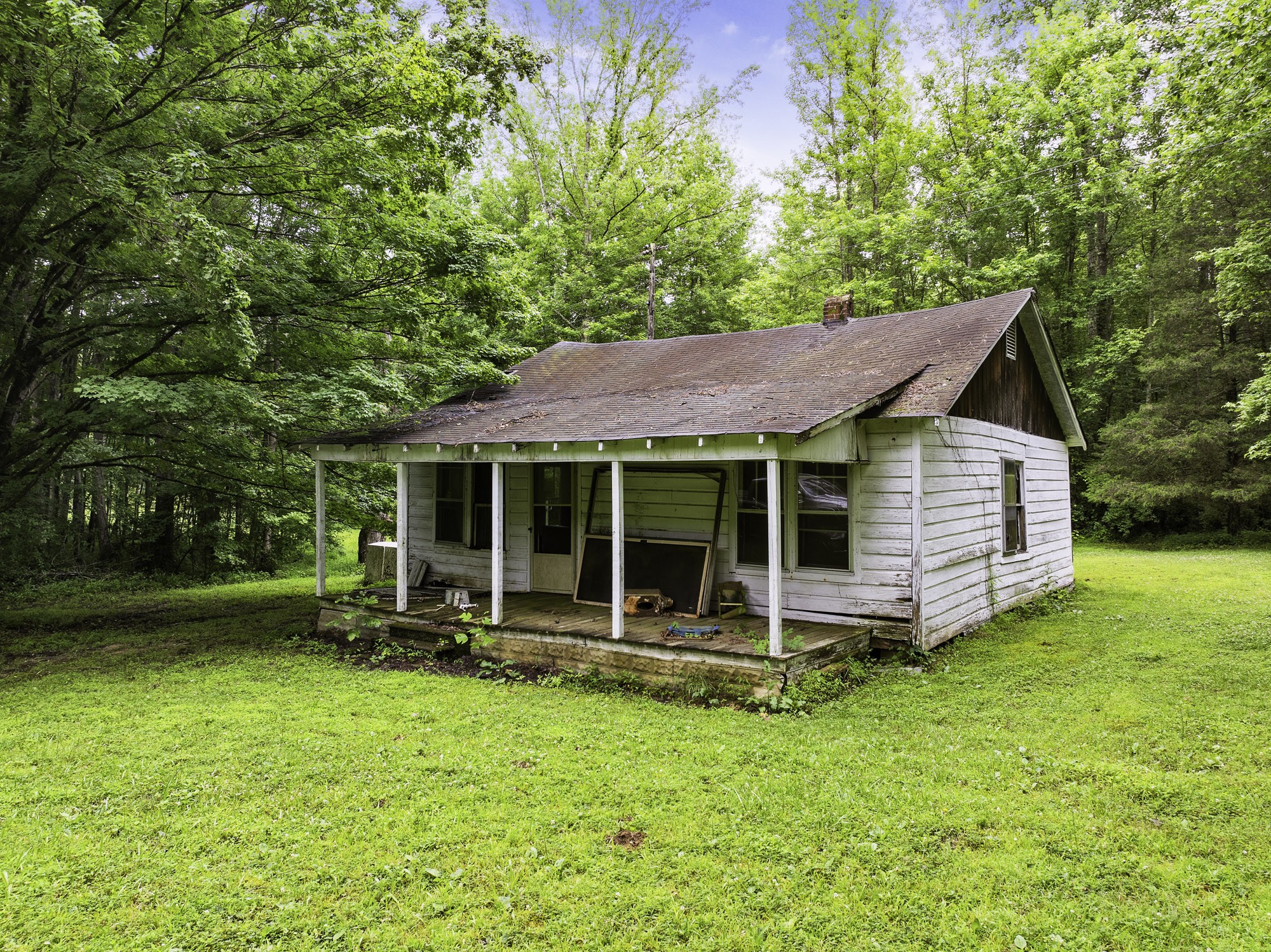 1303 Pugh Road Holladay, TN 38341 - Photo 25 of 32 a view of a house with a yard table and chairs