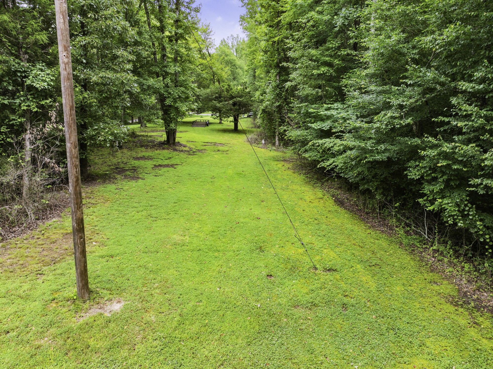 1303 Pugh Road Holladay, TN 38341 - Photo 26 of 32 a view of an outdoor space and swimming pool