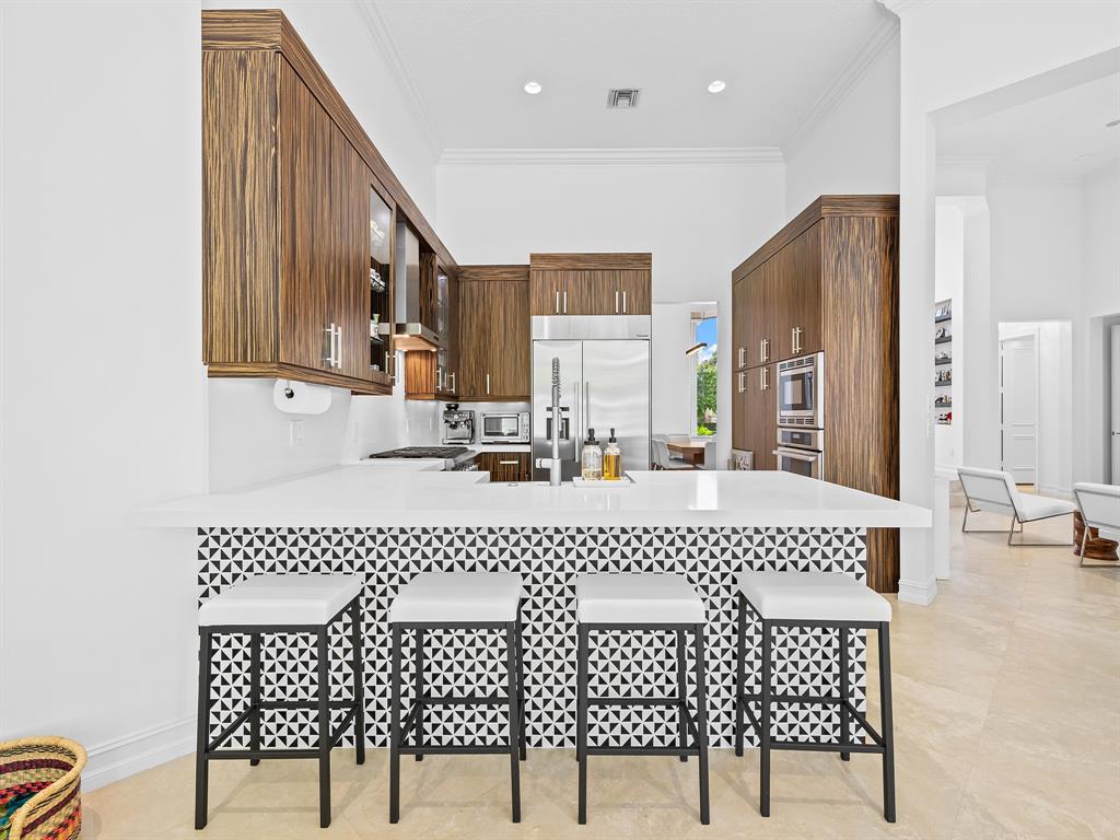 731 Coconut Palm Terrace Plantation, FL 33324 - Photo 16 of 48 a bathroom with a sink and a mirror