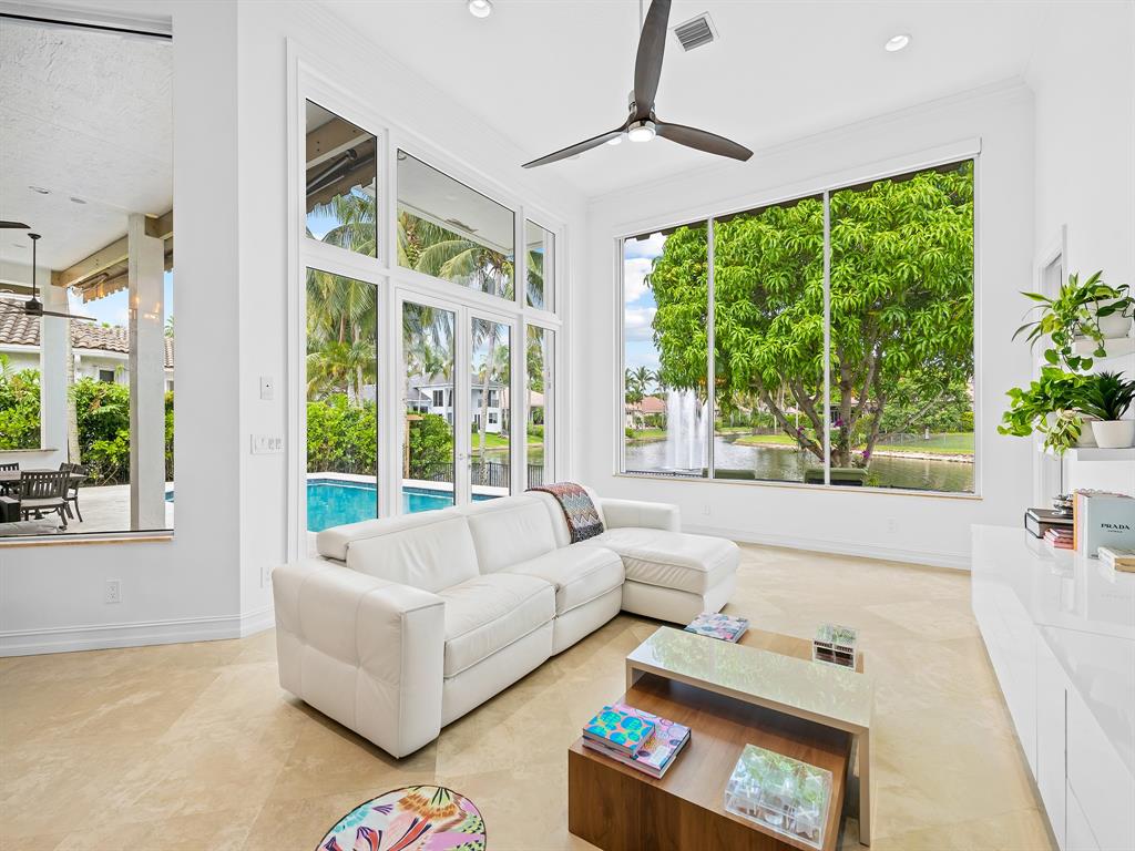 731 Coconut Palm Terrace Plantation, FL 33324 - Photo 17 of 48 a living room with furniture and a large window