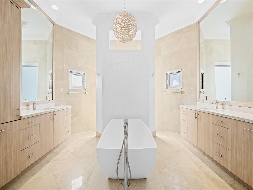 731 Coconut Palm Terrace Plantation, FL 33324 - Photo 20 of 48 a spacious bathroom with a double vanity sink mirror and