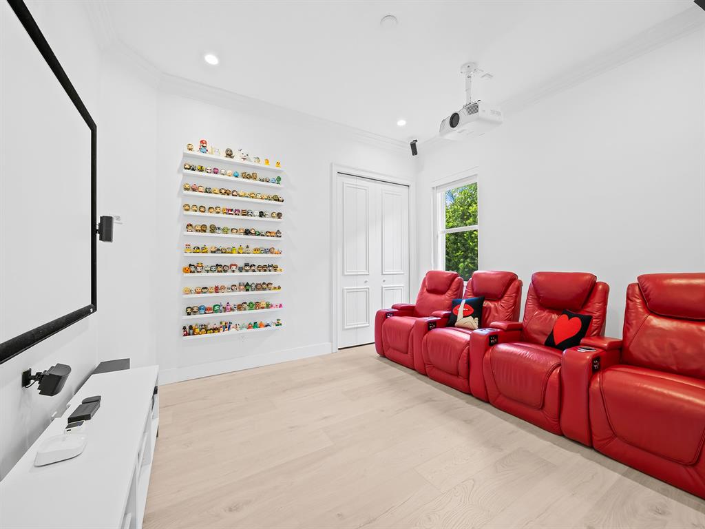 731 Coconut Palm Terrace Plantation, FL 33324 - Photo 26 of 48 a living room with furniture and a flat screen tv