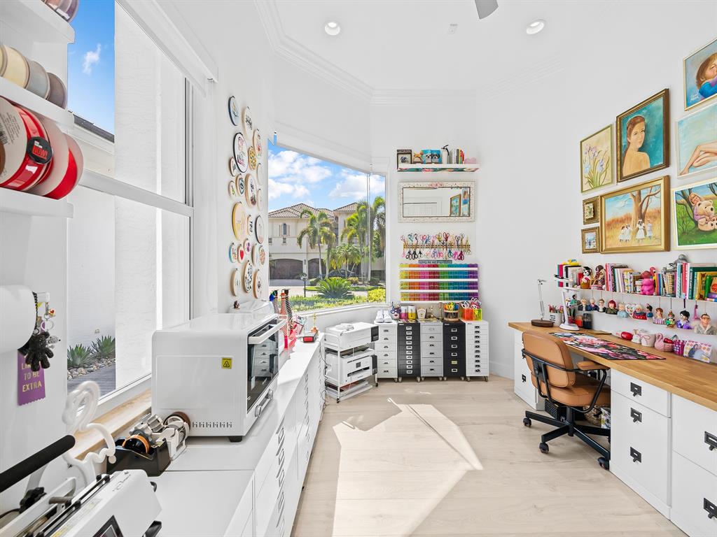 731 Coconut Palm Terrace Plantation, FL 33324 - Photo 29 of 48 a bedroom with a bed and a desk