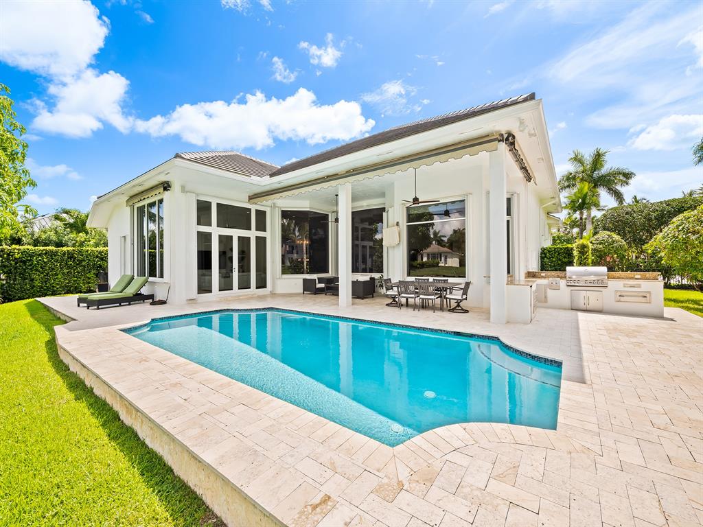 731 Coconut Palm Terrace Plantation, FL 33324 - Photo 34 of 48 a view of a house with pool and chairs