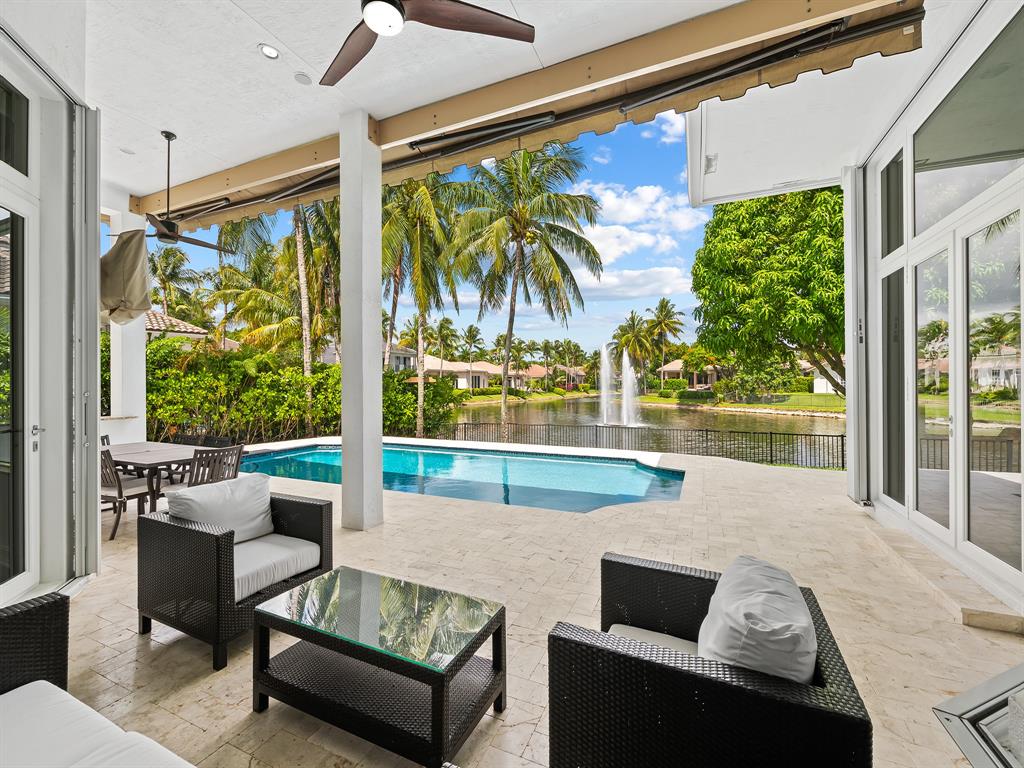 731 Coconut Palm Terrace Plantation, FL 33324 - Photo 35 of 48 a living room with couch and a large window
