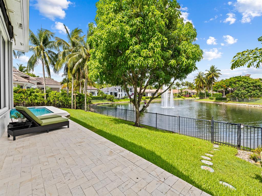 731 Coconut Palm Terrace Plantation, FL 33324 - Photo 36 of 48 a view of backyard with swimming pool and outdoor seating