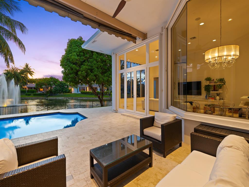 731 Coconut Palm Terrace Plantation, FL 33324 - Photo 43 of 48 a view of a patio with swimming pool table and chairs