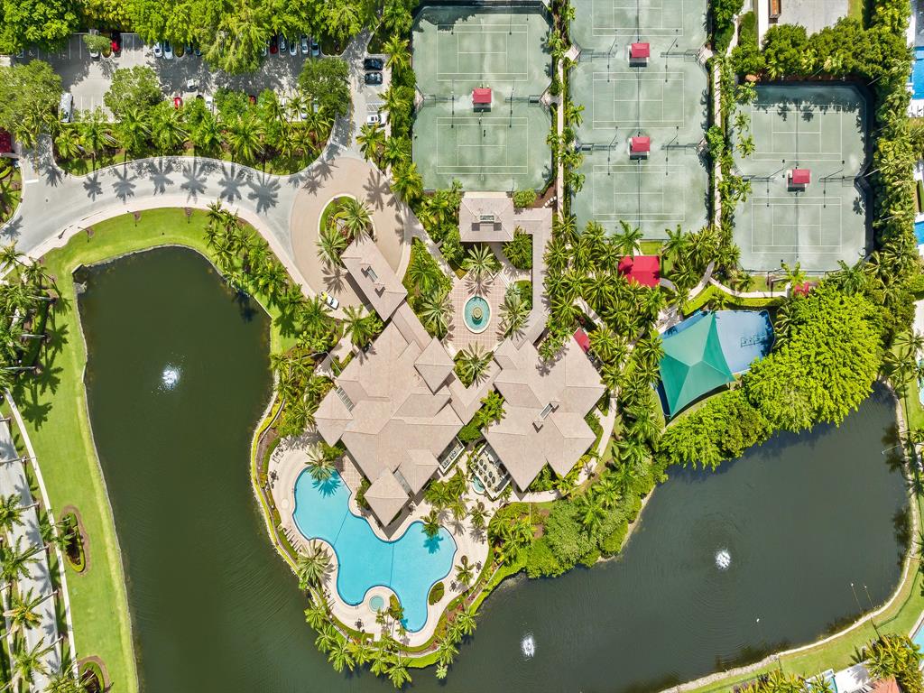 731 Coconut Palm Terrace Plantation, FL 33324 - Photo 46 of 48 a picture of a table with chairs