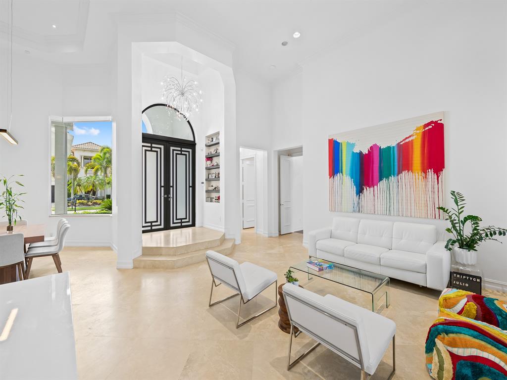 731 Coconut Palm Terrace Plantation, FL 33324 - Photo 8 of 48 a living room with furniture and a potted plant