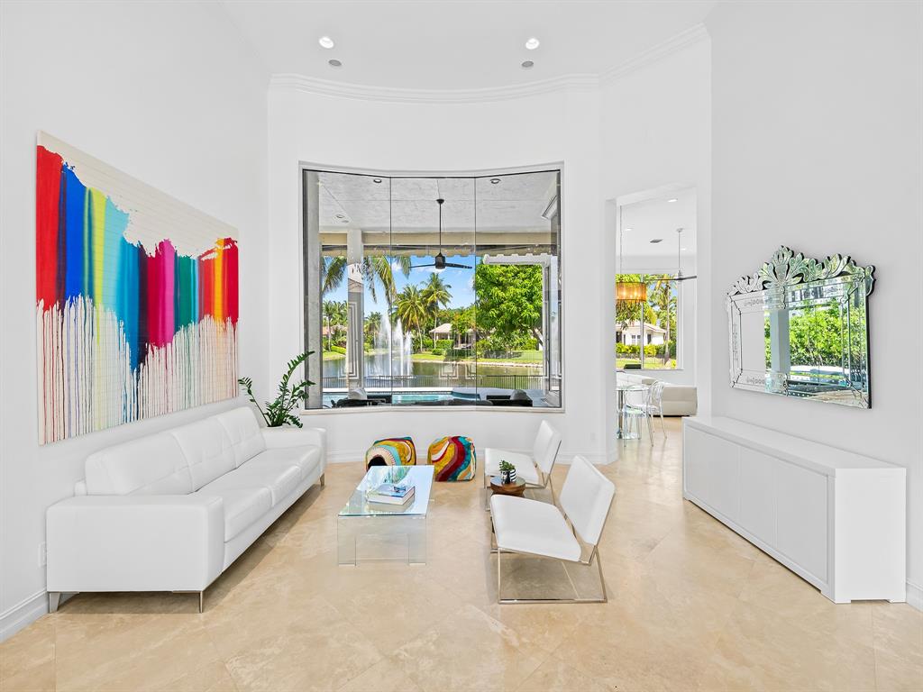 731 Coconut Palm Terrace Plantation, FL 33324 - Photo 9 of 48 a living room with furniture and a large window