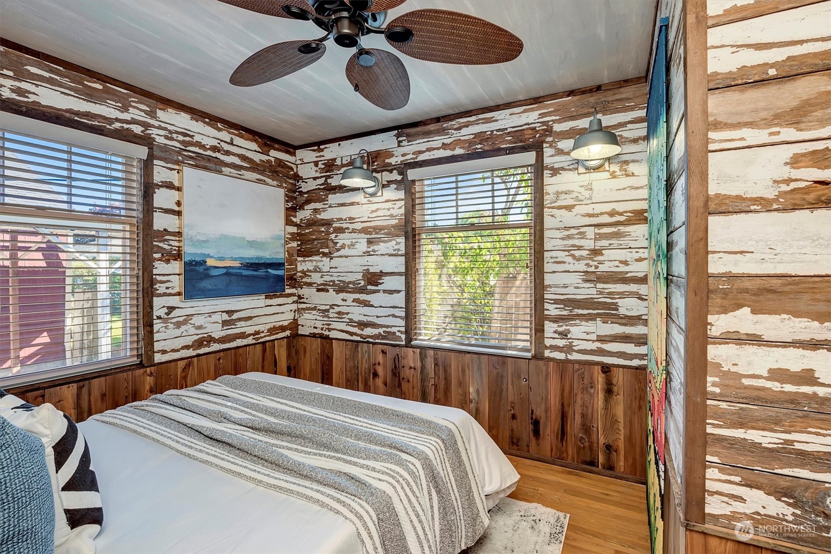 513 Meade Avenue Sumner, WA 98390 - Photo 17 of 35 a bedroom with a large bed and a window