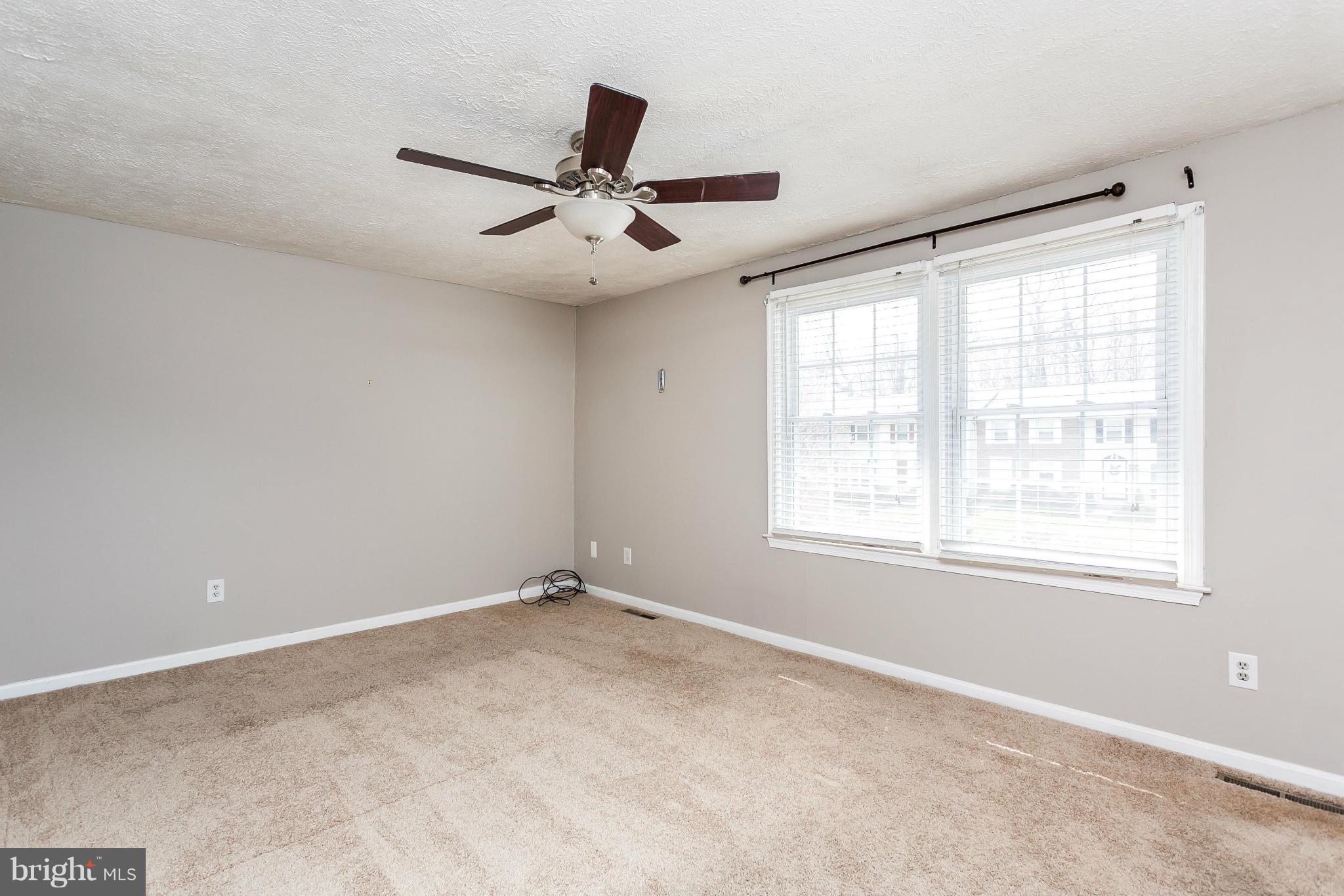 4804 Variation Road Baltimore, MD 21236 - Photo 14 of 27 a view of an empty room with a window