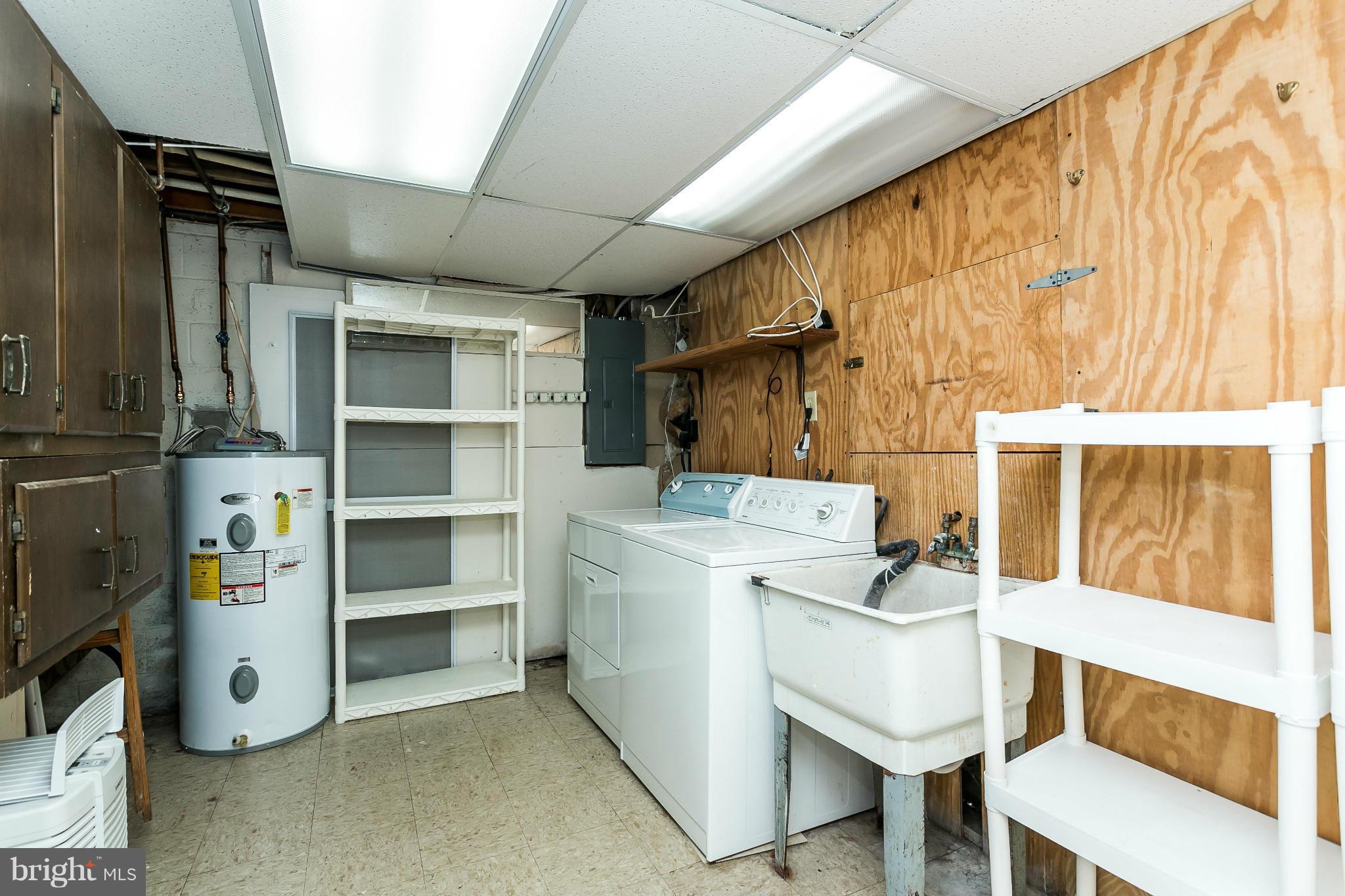 4804 Variation Road Baltimore, MD 21236 - Photo 19 of 27 a utility room with dryer and washer