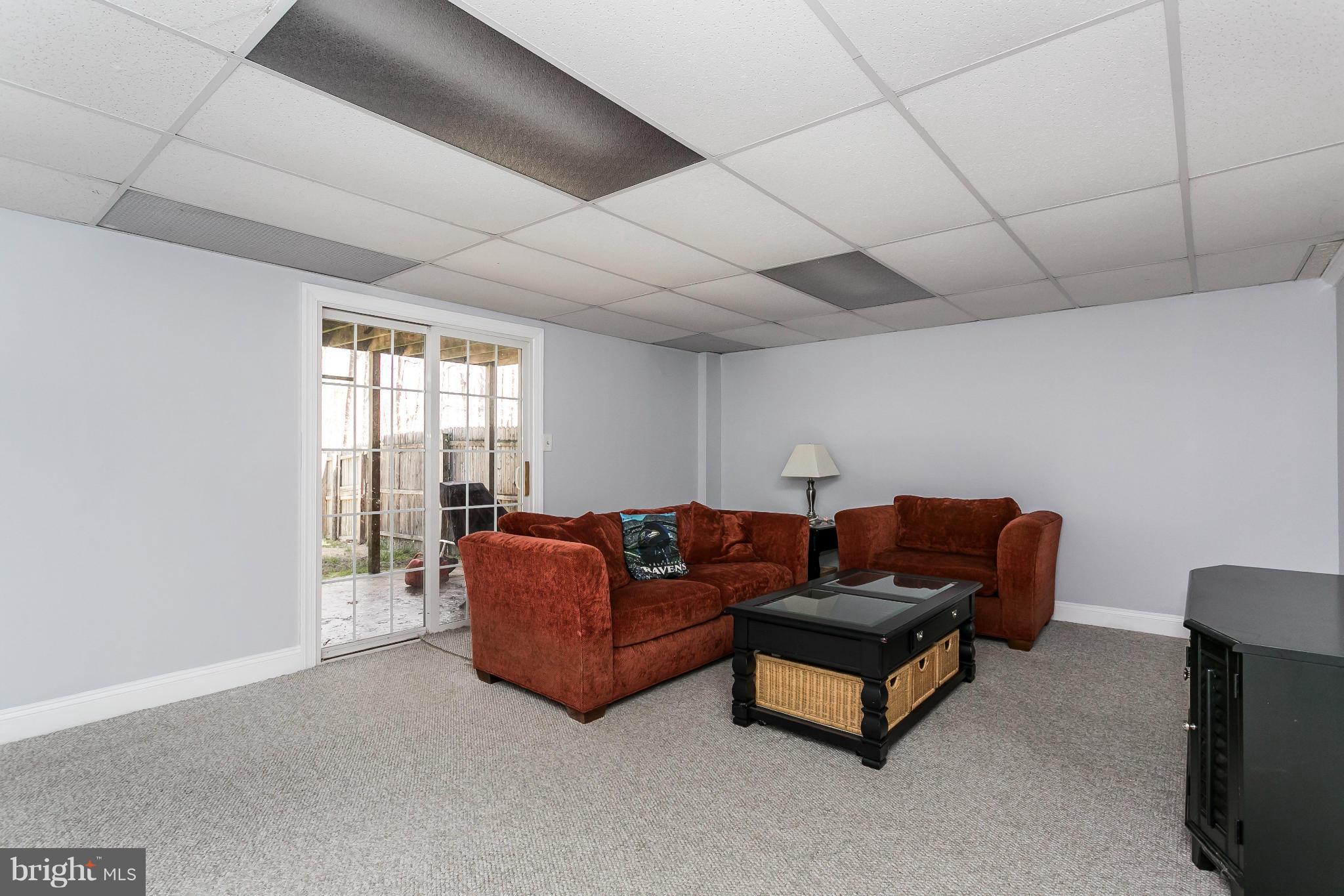 4804 Variation Road Baltimore, MD 21236 - Photo 21 of 27 a living room with furniture and a window