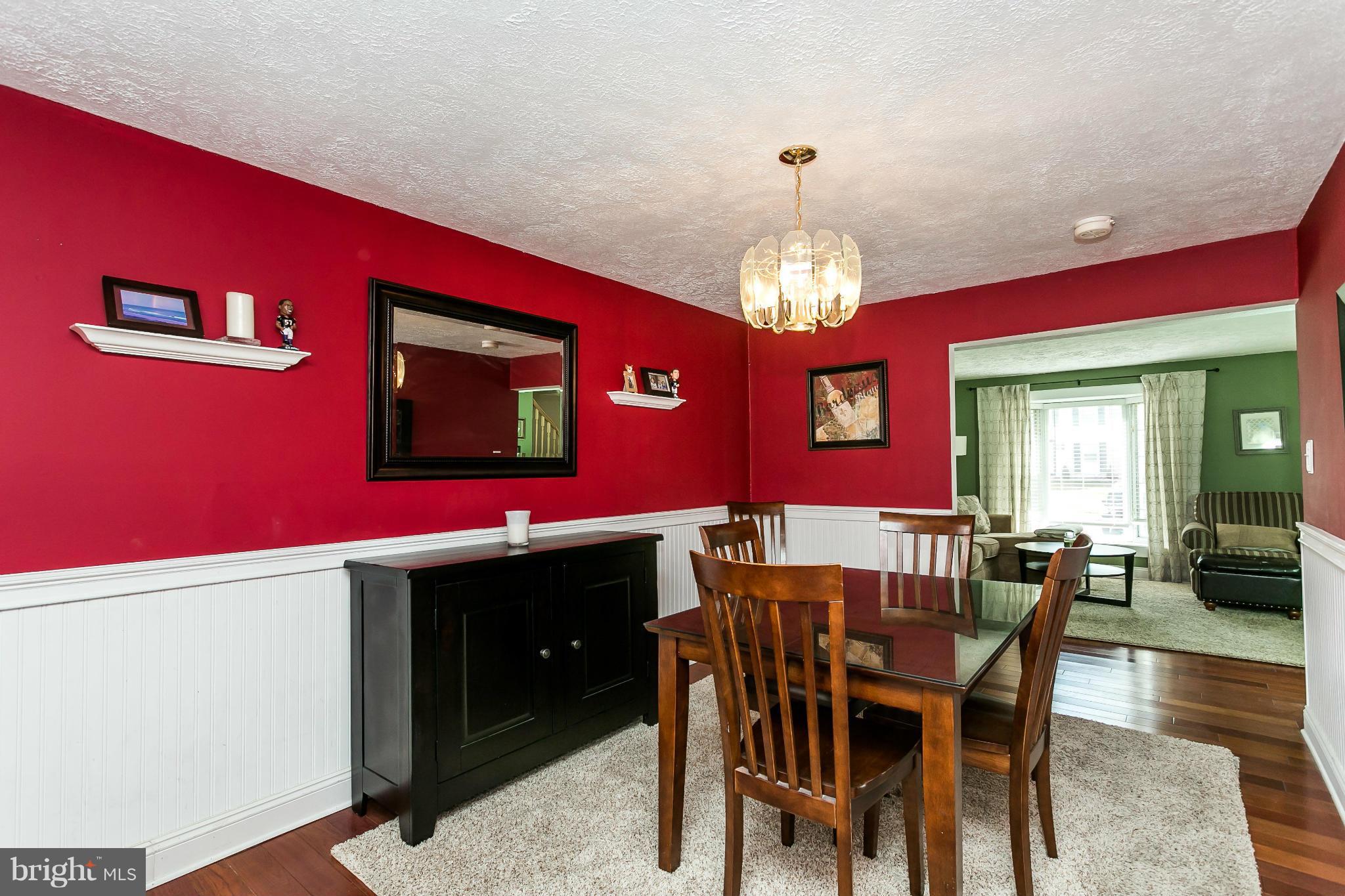 4804 Variation Road Baltimore, MD 21236 - Photo 8 of 27 a view of a dining room with furniture and chandelier