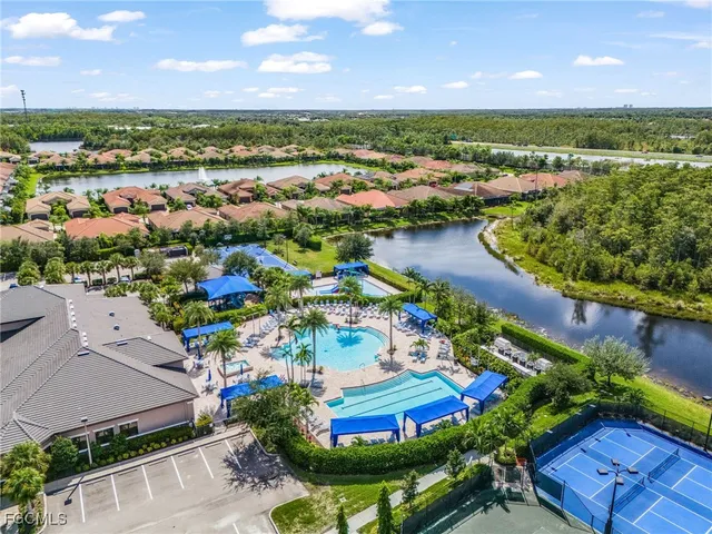 a view of a swimming pool with a patio