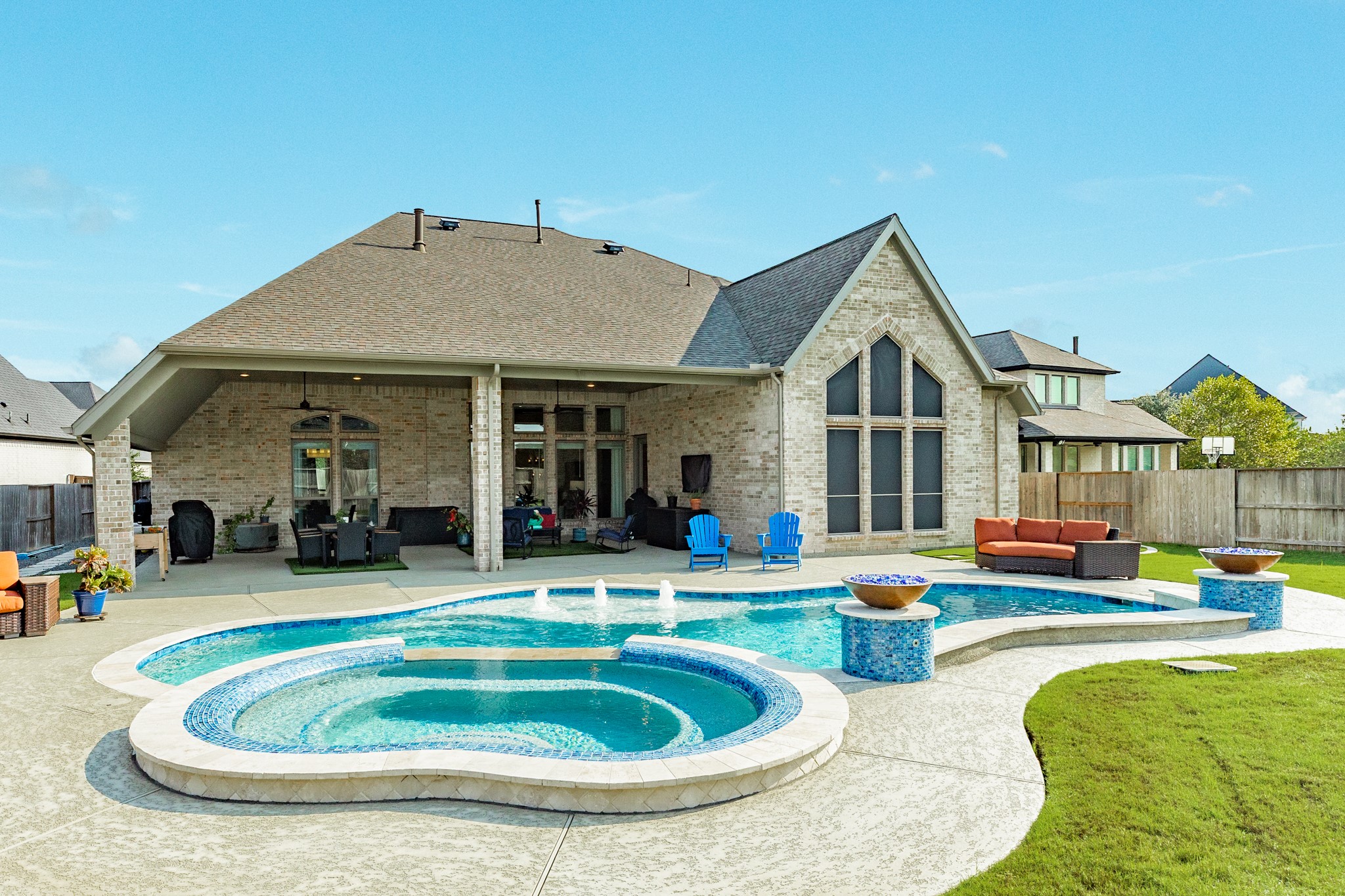 9538 Sanger Way Manvel, TX 77578 - Photo 1 of 50 Welcome home to your very own private oasis! Enjoy a permanent staycation right in your own backyard with this prestigious, all-brick Perry home. This entertainer's dream features a sparkling pool complete with a tanning ledge and soothing bubblers, a relaxing hot tub, and two dramatic fire bowls that set the perfect ambiance for evening gatherings. Don't let this incredible opportunity slip away—schedule your private tour today!