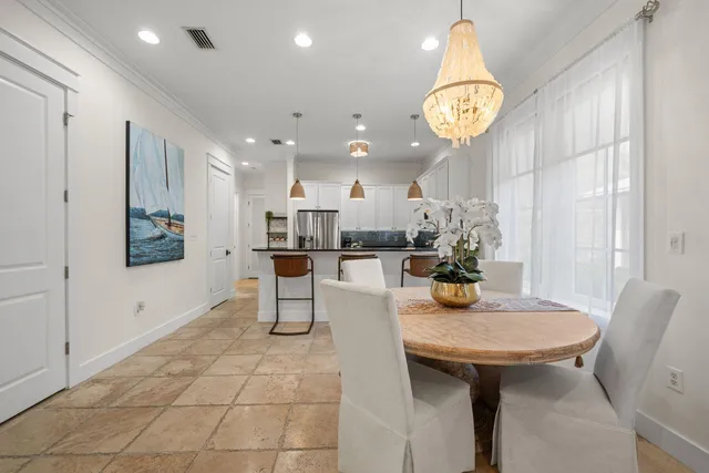 a view of a patio with couches and potted plants