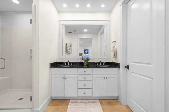 a view of a lake with a sitting area