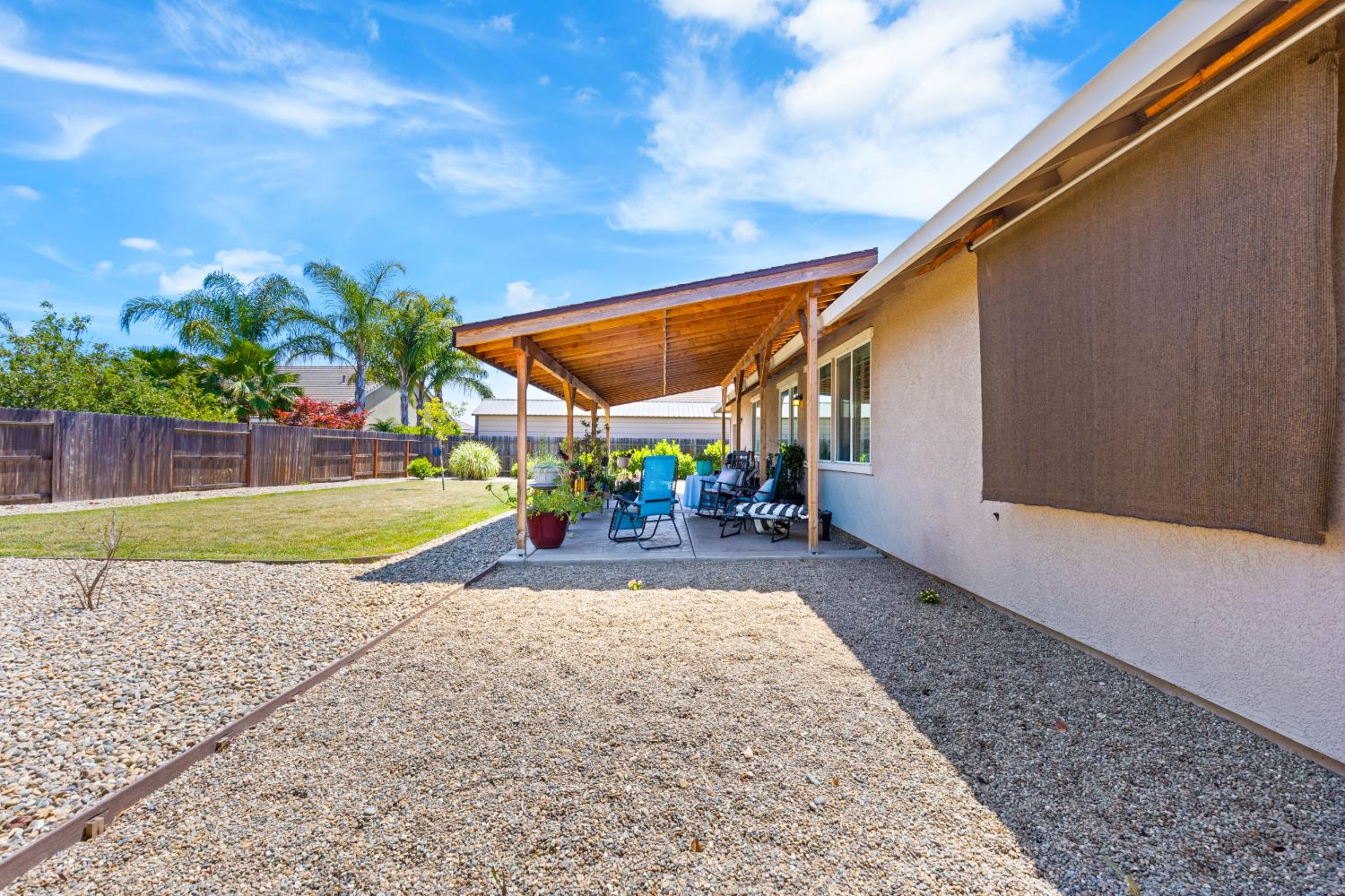 2011 Roy Ranch Way Plumas Lake, CA 95961 - Photo 26 of 49 a view of a backyard with a garden