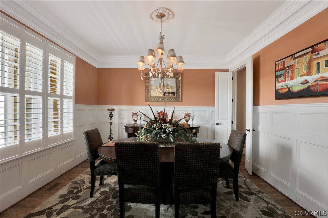 3830 Bircham Loop Midlothian, VA 23113 - Photo 3 of 33 a view of a dining room with furniture window and wooden floor