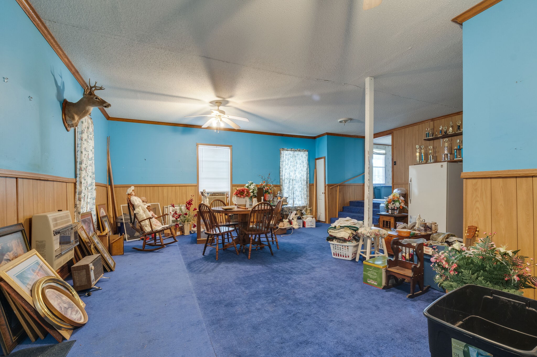 693 Littrell Road Loretto, TN 38469 - Photo 40 of 57 a living room with furniture and a large window