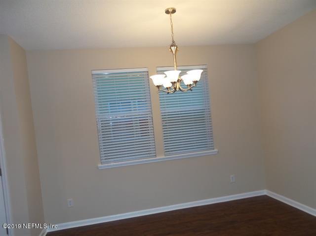 124 Bay Bridge Drive St. Augustine, FL 32080 - Photo 14 of 19 a view of a livingroom with windows