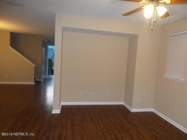 124 Bay Bridge Drive St. Augustine, FL 32080 - Photo 16 of 19 wooden floor in an empty room