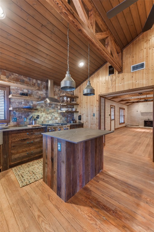 518 Curly H Ranch Road Dripping Springs, TX 78620 - Photo 13 of 40 a kitchen with a wooden floor
