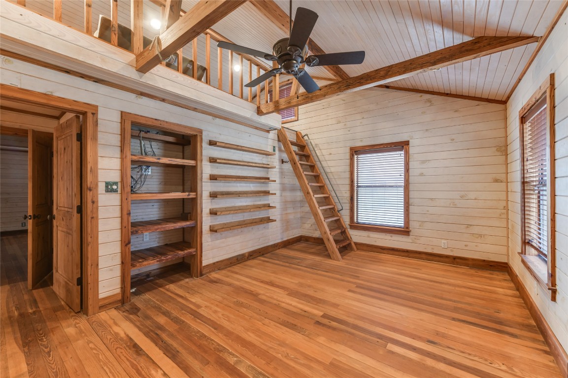 518 Curly H Ranch Road Dripping Springs, TX 78620 - Photo 16 of 40 a view of a livingroom with a staircase