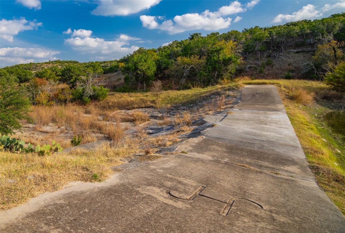 518 Curly H Ranch Road Dripping Springs, TX 78620 - Photo 35 of 40 a view of a yard