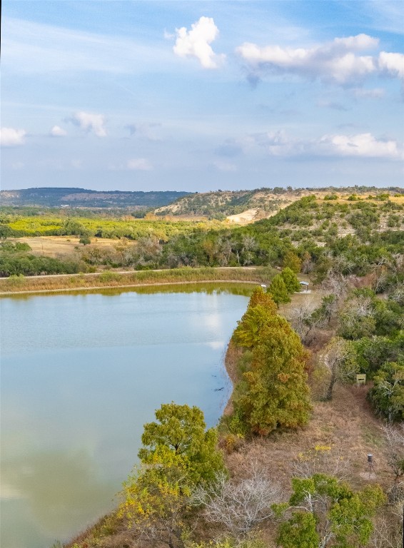 518 Curly H Ranch Road Dripping Springs, TX 78620 - Photo 4 of 40 a view of an ocean and beach