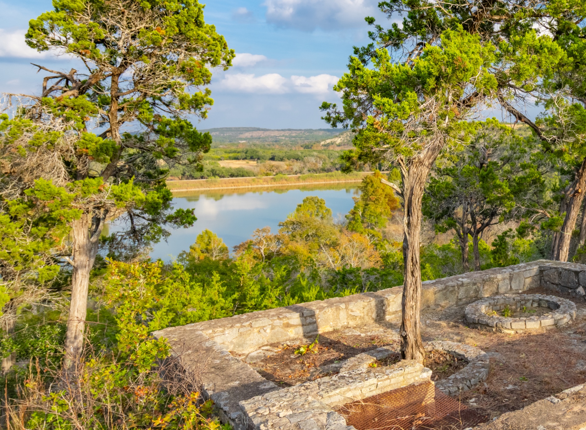 518 Curly H Ranch Road Dripping Springs, TX 78620 - Photo 5 of 40 a view of a lake with a yard