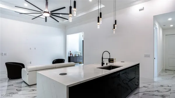 a view of a bathroom sink and a mirror