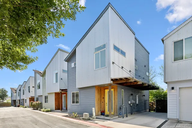 a view of a street with buildings