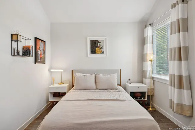 a bedroom with a bed and furniture