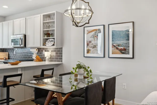 a view of a workspace with furniture